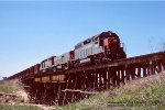 SSW, Cotton Belt 7962-SP 1611-SSW 7963, is eastbound crossing over Greens Bayou at Houmont Park, Texas. March 8, 1984. 